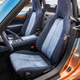 Illustration for article titled Placate Your Fears Of Global Economic Collapse With This Two-Tone Miata With A Denim Interior